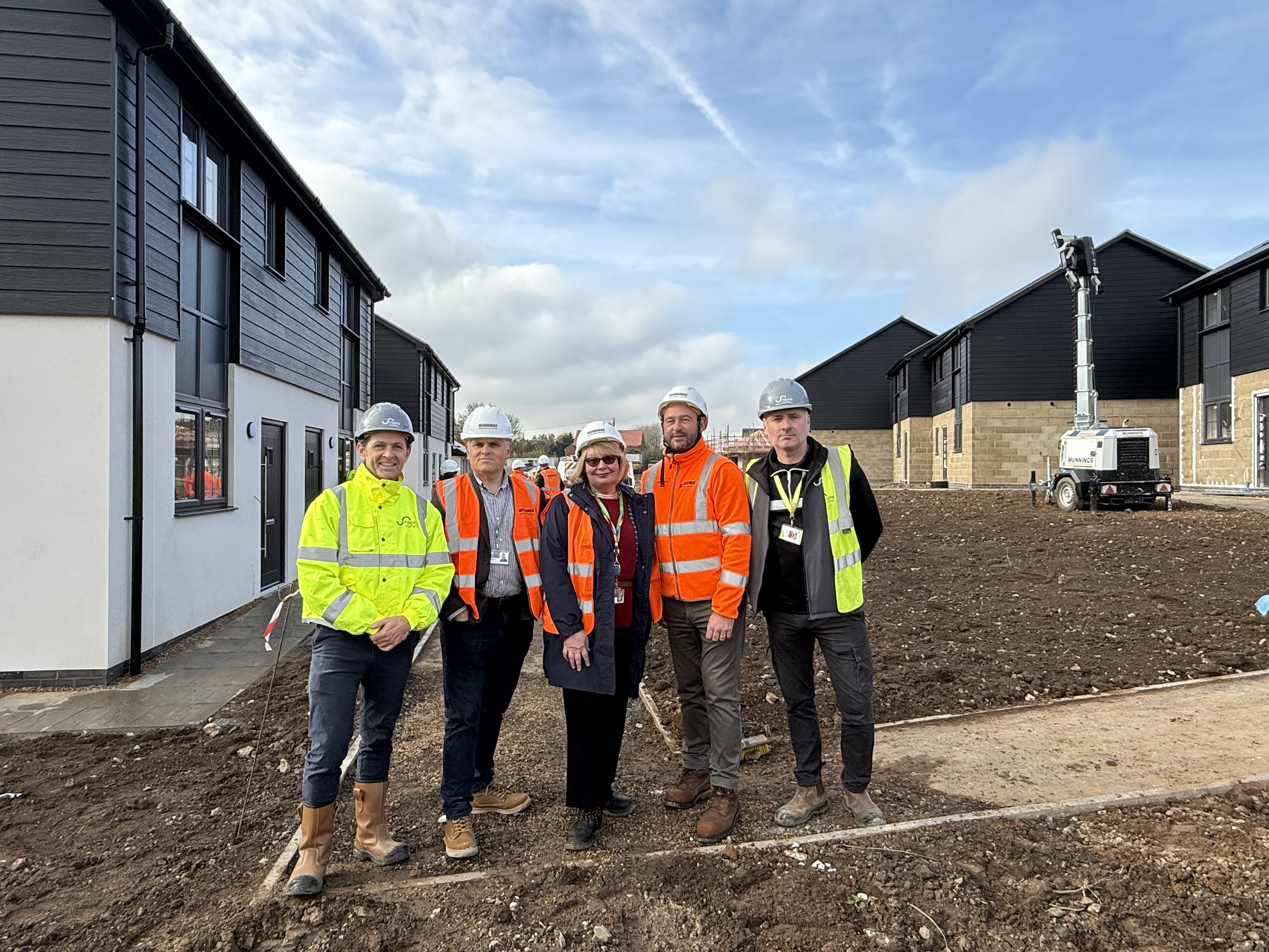 L-R: Kai Gibbon (Flagship Homes), Steve Blatch and Wendy Fredericks (NNDC), Phil Munnings (Munnings Construction) and Stephen Jones (Flagship Homes) at the Stiffkey Road site in Warham