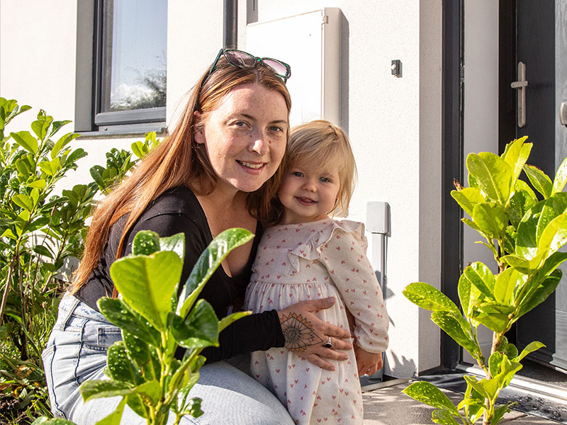 lady and child at front door