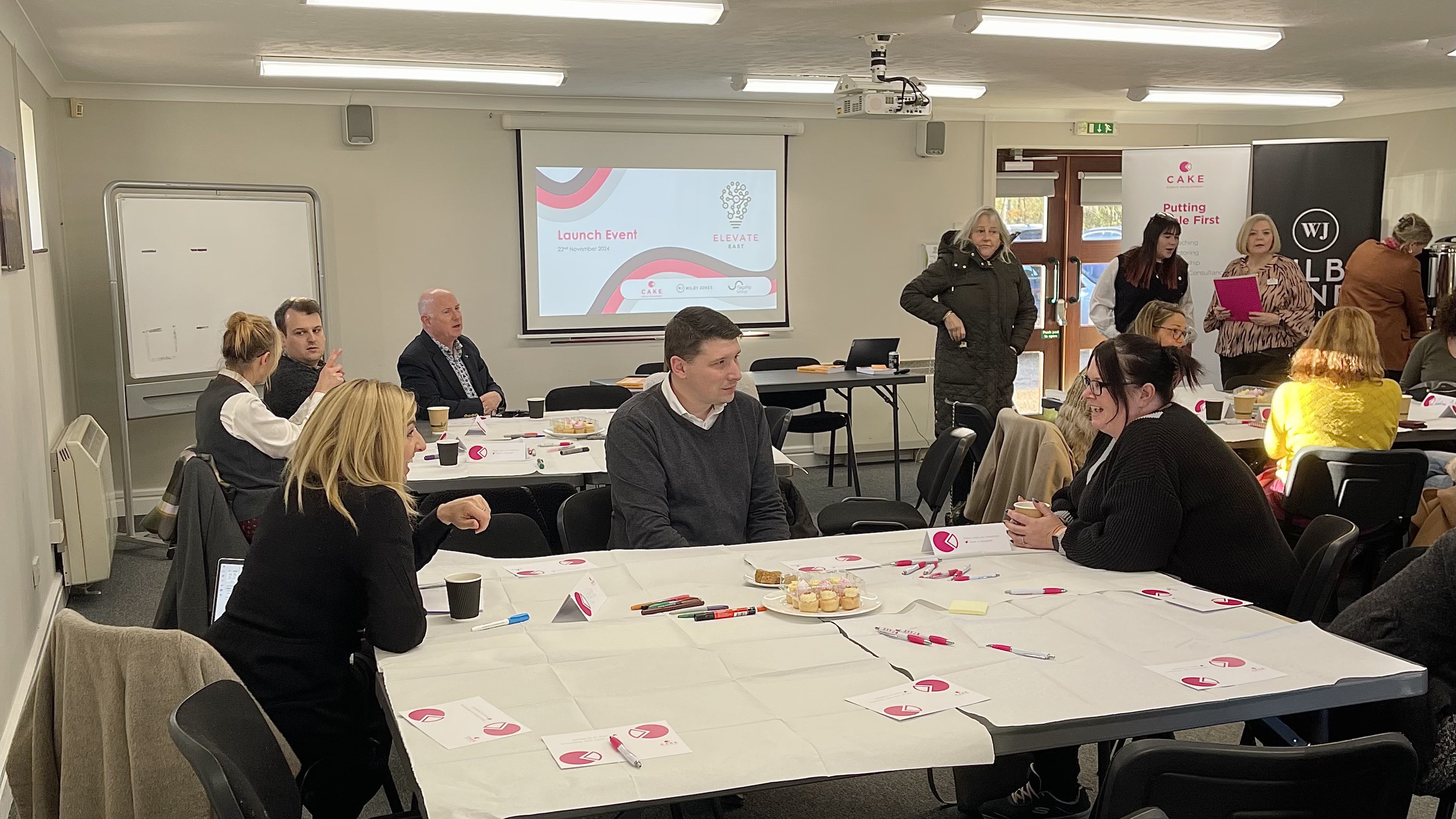 Attendees deep in discussion at the launch event for new East Anglian learning & development network Elevate East