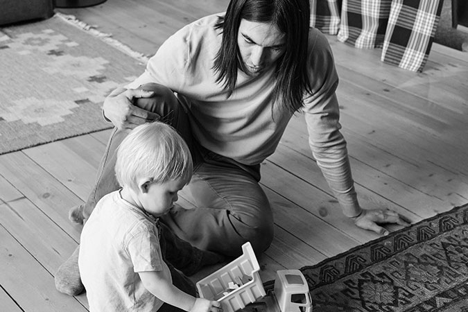 Playing with a child on the floor
