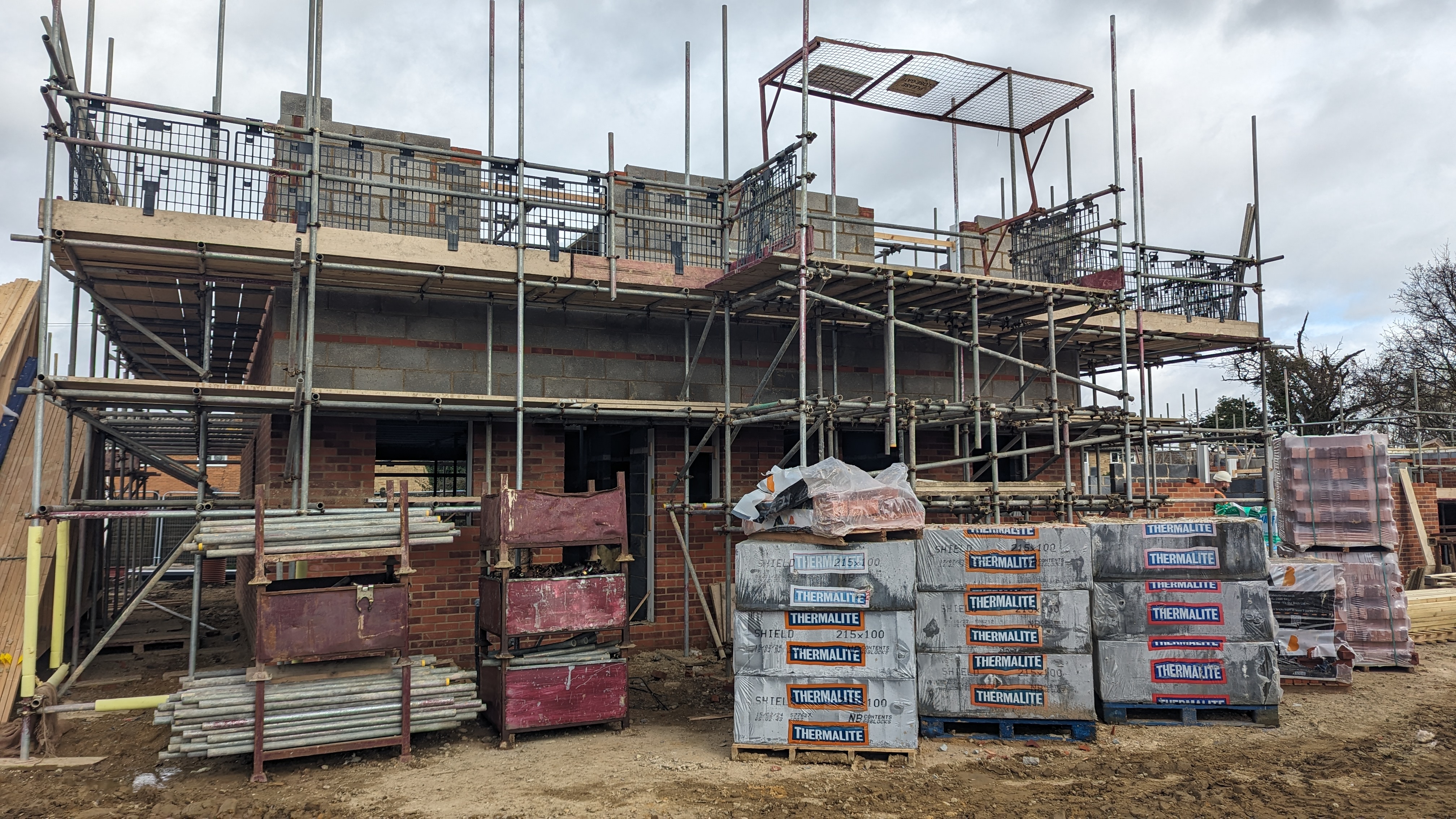 Construction well under way with construction materials outside an in-progress home at the Flagship Homes/Marfleet and Blyth development in South Close, Leiston