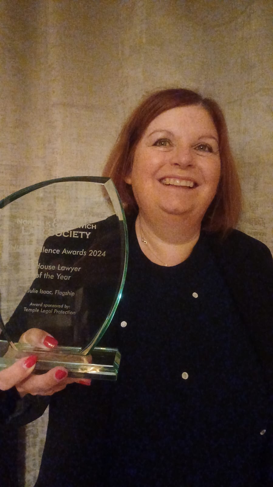 Flagship's Julie Isaac poses with her In-house Lawyerof the Year award from the Norfolk and Norwich Law Society Excellence Awards