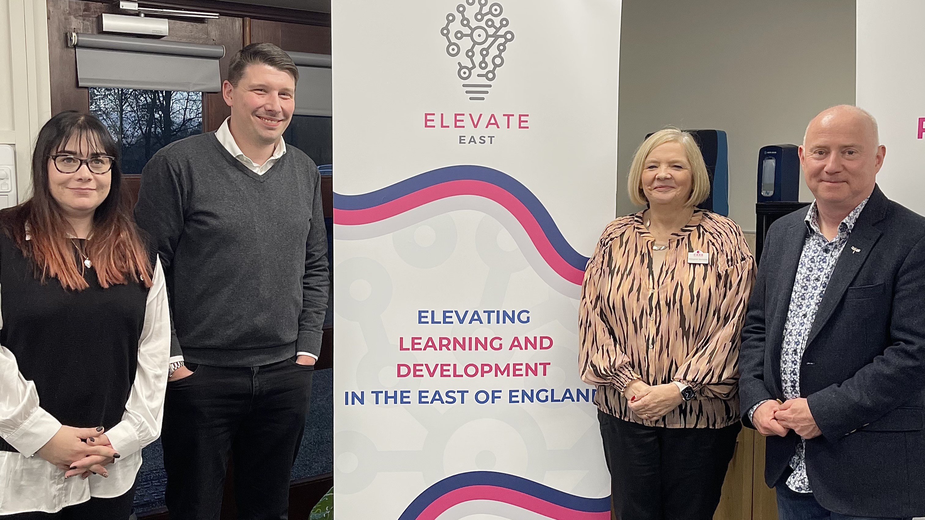 L-R: Nadine Tapp, Matthew Casanova, Margaret Burnside and Andy Lancaster pose with a banner at the launch of new East Anglian learning & development network Elevate East at its recent launch event