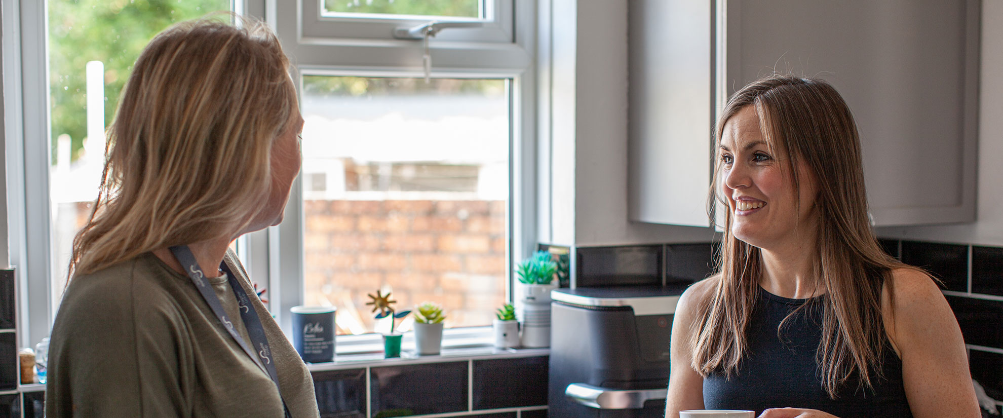 customers chatting in the kitchen